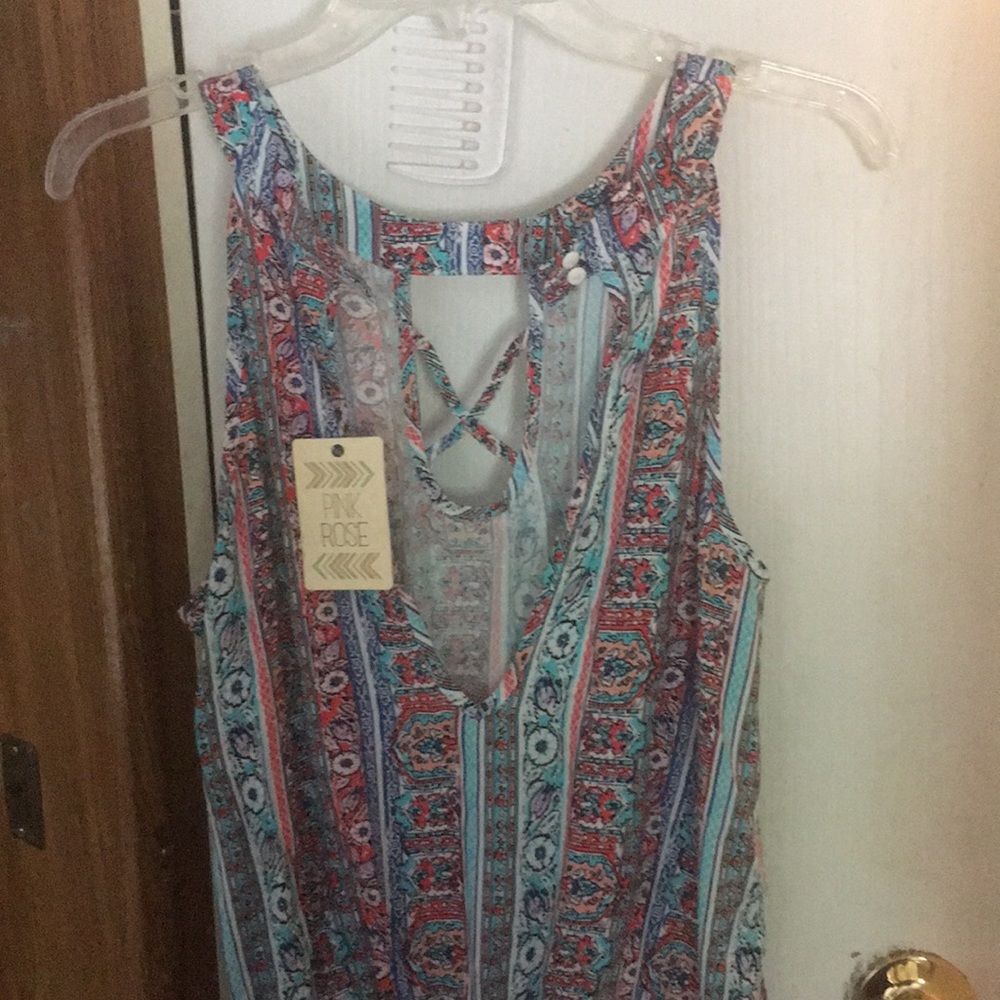 Romper Brand new. Junior L size